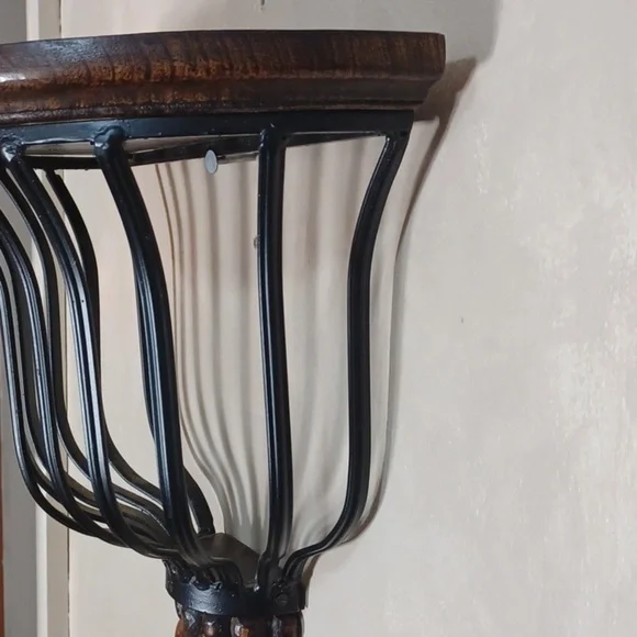 Beautiful accent shelf black worght iron basket dark wood shelf and bottom
